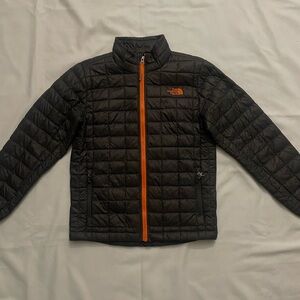 The North Face Quilted Jacket in Black and Orange